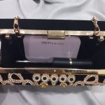 Golden and Black Fancy Clutch Price