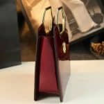 Shop Maroon Luxury handbag